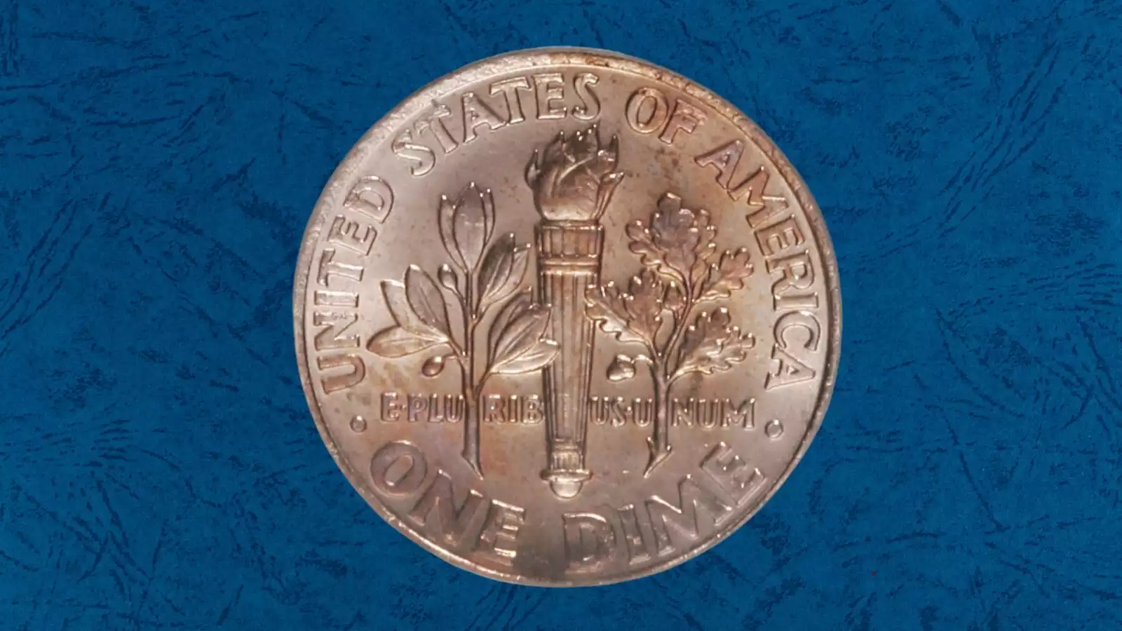 2006 dime missing clad layer error with copper core exposed on obverse